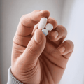 Hand Holding Pain Pills